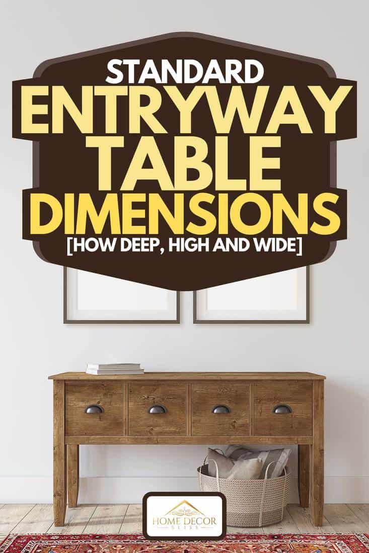 Une table console en bois près d'un mur blanc avec deux cadres vides, dimensions de la table d'entrée standard [How Deep, High and Wide]