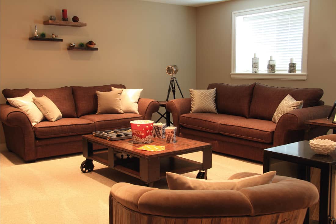 TV room with brown couch and loveseats, snacks on the center table, 11 Great Couch And Loveseat Arrangement Ideas