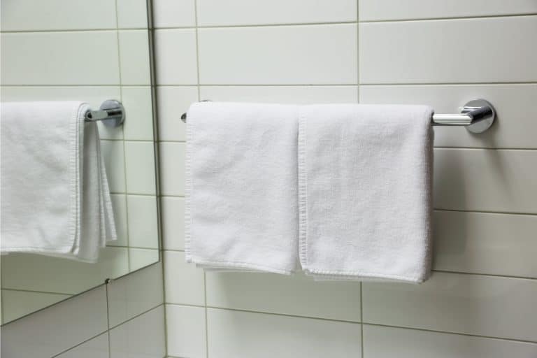 Towel with reflection in the mirror, 15 Awesome Bathroom Towel Rack Ideas
