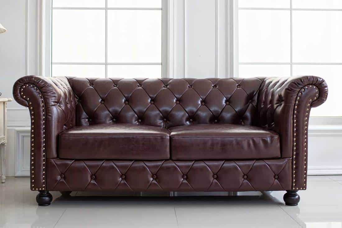 A vintage style of interior decoration the leather sofa in white room, How Long Do Bonded Leather Couches Last