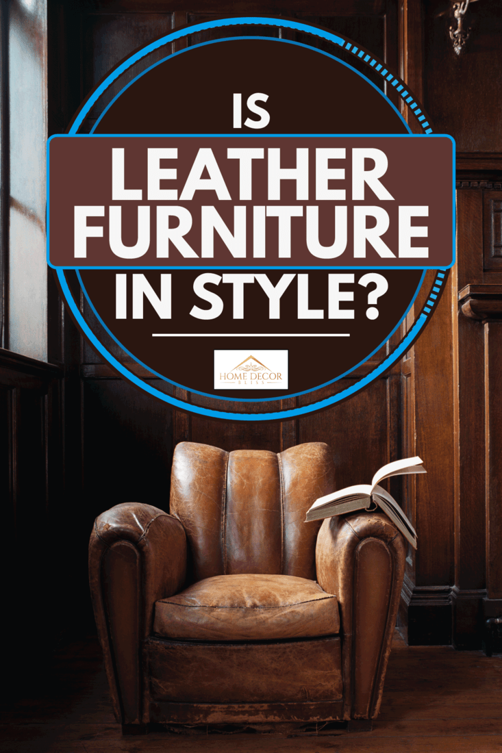 Aged leather armchair with book on the armrest, Is Leather Furniture In Style?