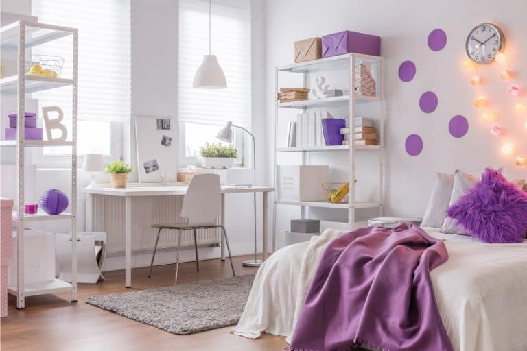 Purple and white bedroom with study desk infront of two windows and purple blanket on the bed, 21 Awesome Purple Bedroom Ideas