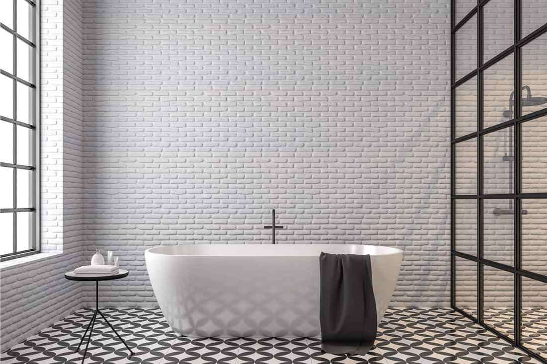 Loft style bathroom, white brick wall, black and white tile floor pattern, 11 Fantastic Bathroom Wall Tile Ideas
