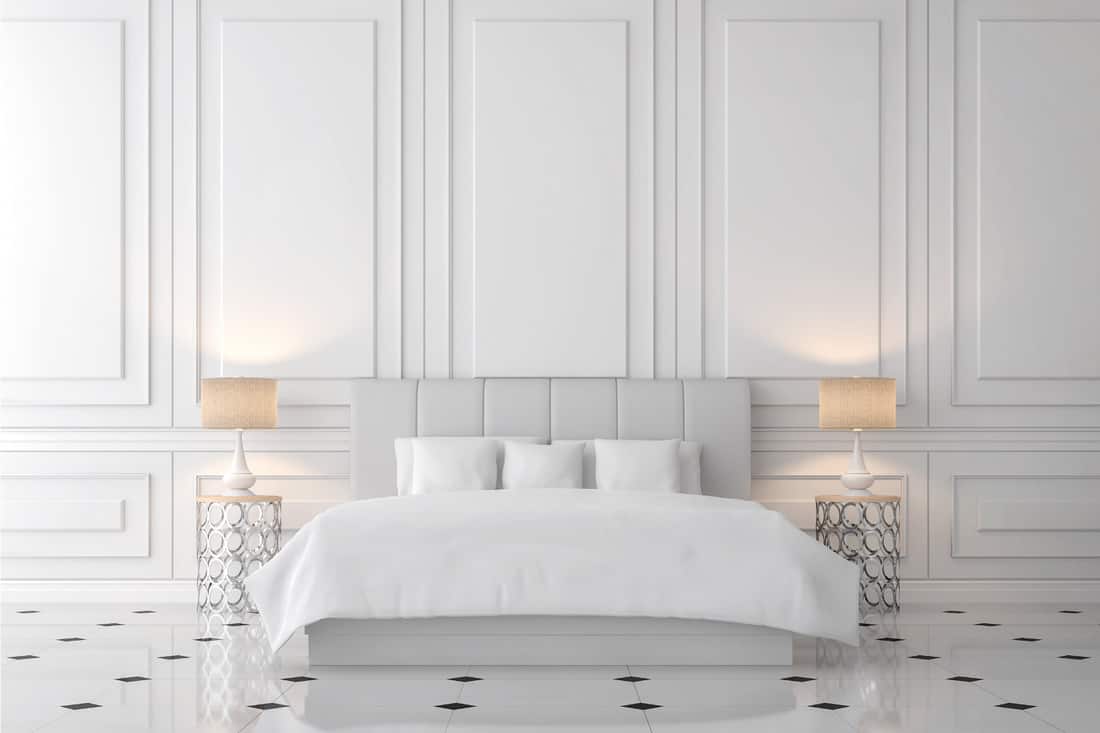 Modern classic bedroom with white wall, furnished with light gray leather bed