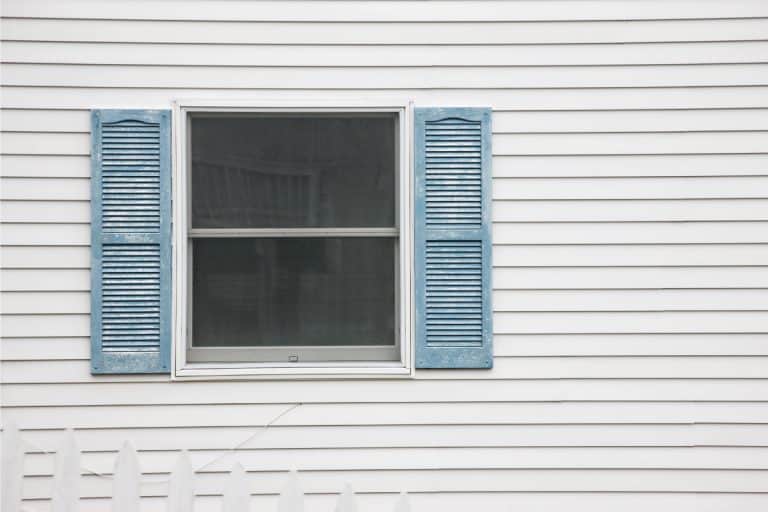 Newly painted vinyl wall siding of a house, What Is The Best Paint To Use On Vinyl Siding?