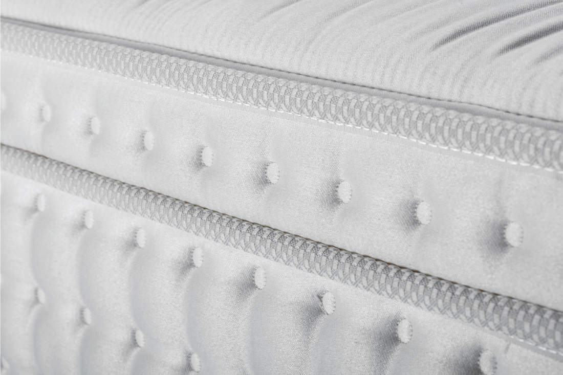 white texture of mattress, bedding pattern, close up photo