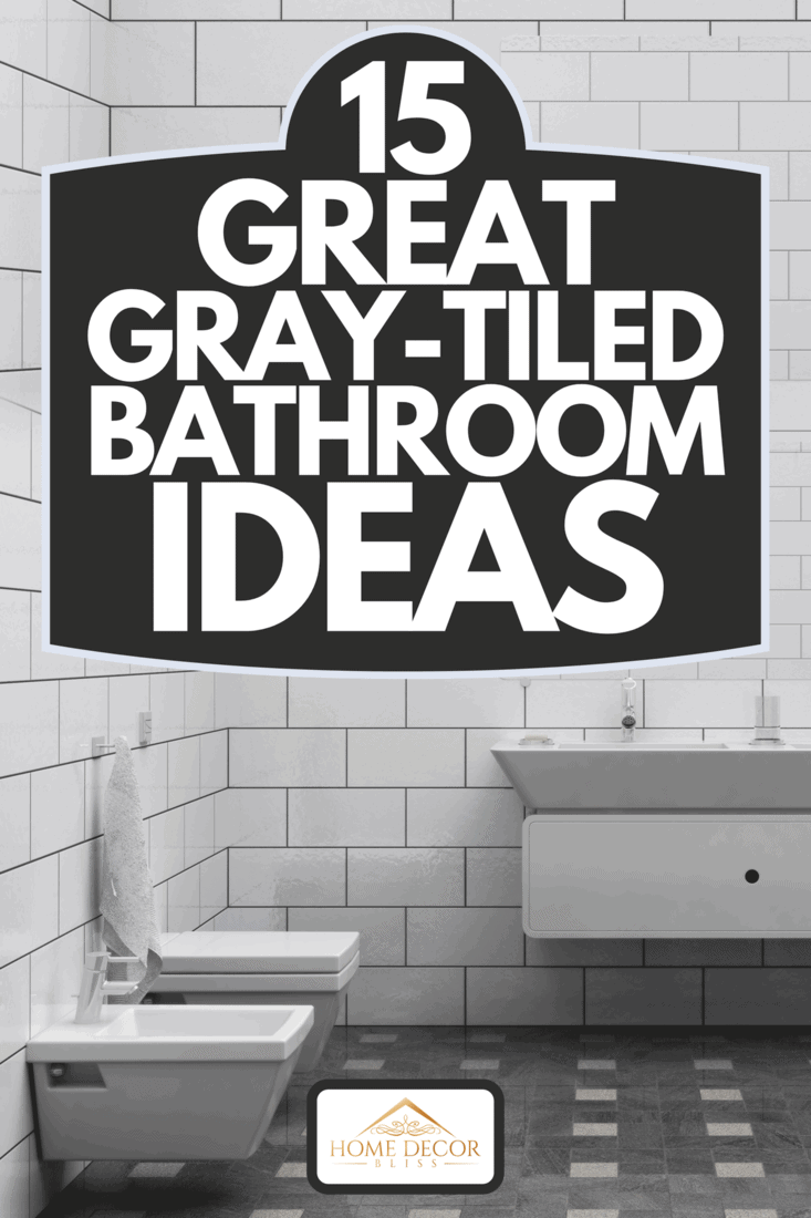 A bathroom interior with wall-hung toilet, tile floor and walls, 15 Great Gray-Tiled Bathroom Ideas