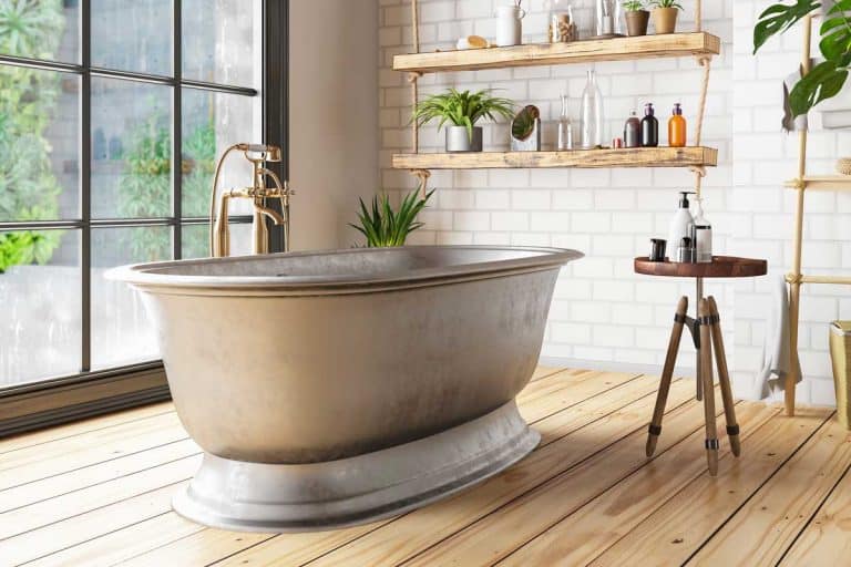 A bathtub in the loft interior bathroom with hardwood floor, 23 Inspiring Bathroom Decoration Ideas