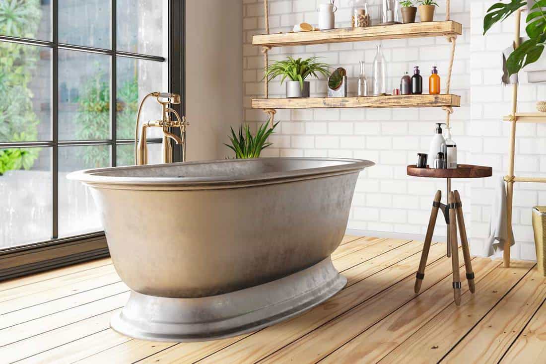 A bathtub in the loft interior bathroom with hardwood floor, 23 Inspiring Bathroom Decoration Ideas