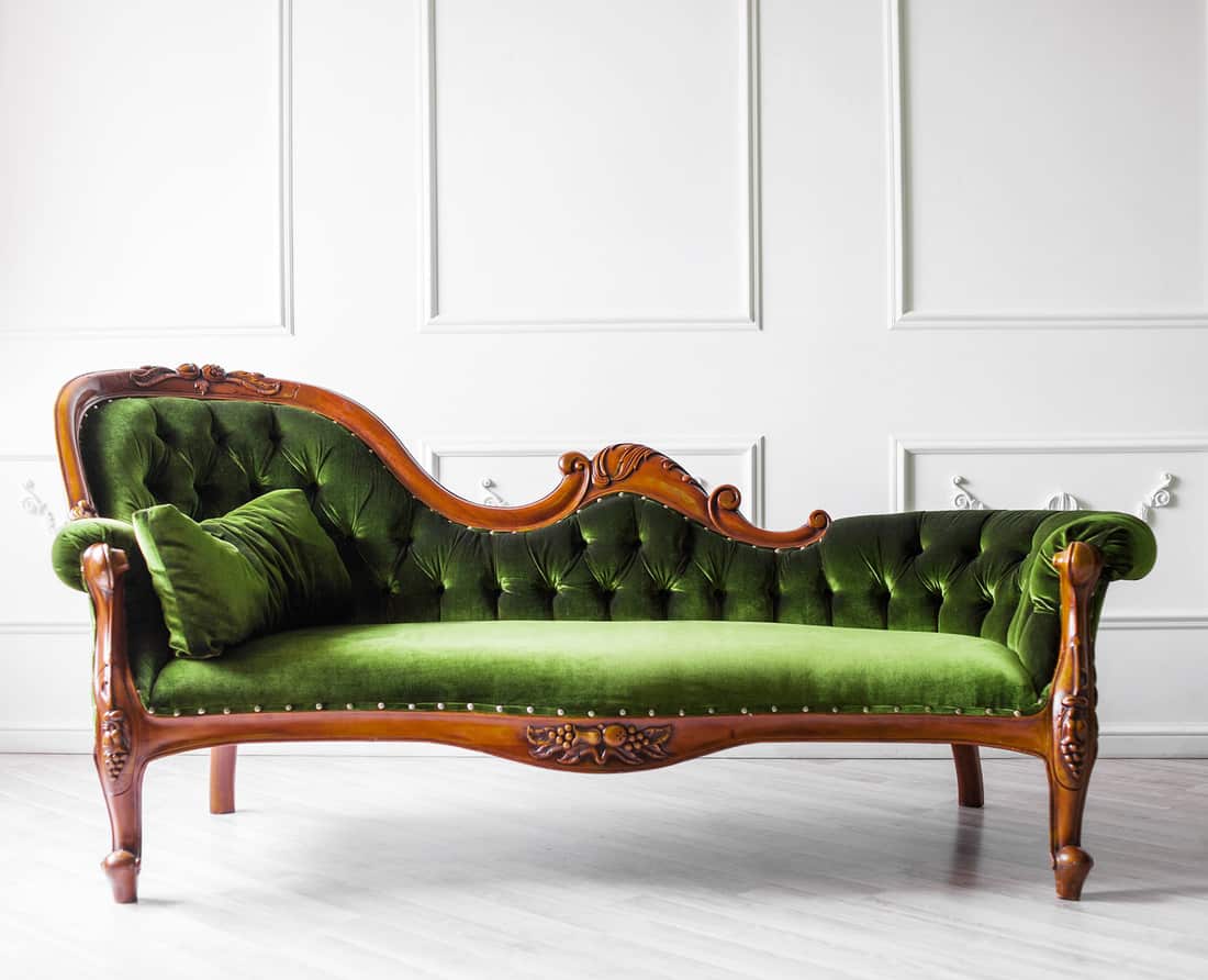Beautiful classic green sofa in a living room