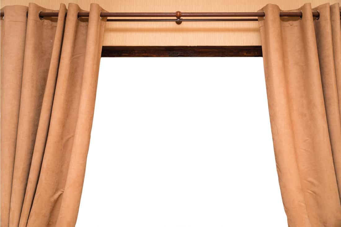 Brown curtains over a white background, velvet curtains