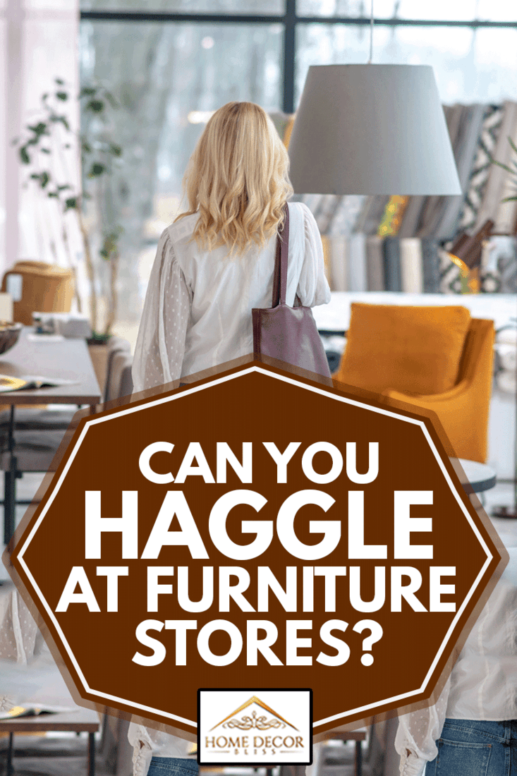 All for the house. Woman in a white blouse with a burgundy bag on her shoulder, standing with her back in the furniture salon., Can You Haggle At Furniture Stores?