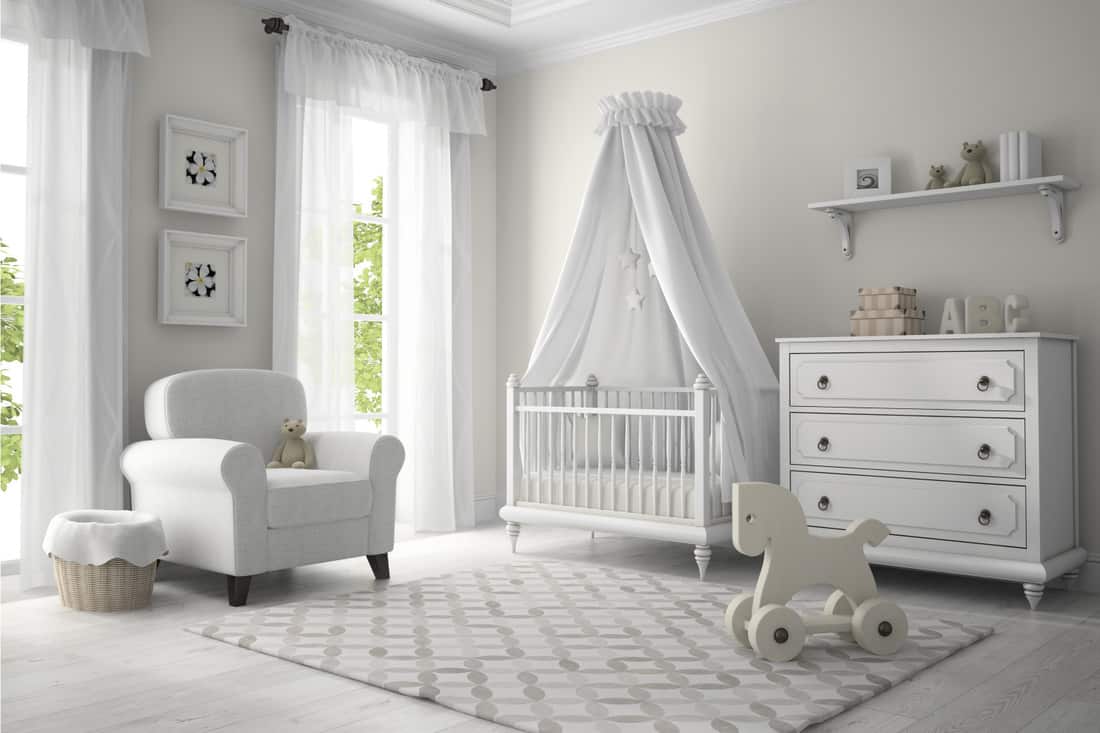 Classic nursery room in white color and curtains with valances