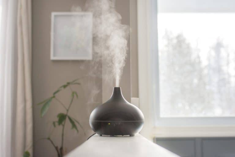 Essential oils diffusing at home in the morning light. 4 Ways To Use Liquid Potpourri