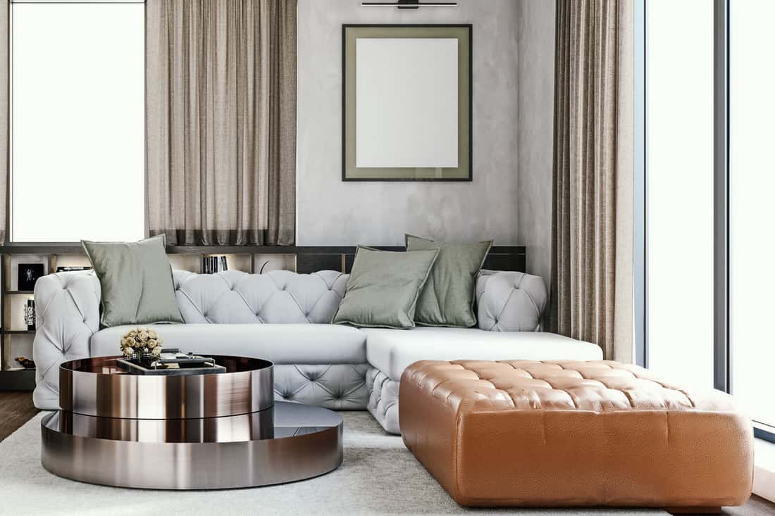 Gorgeous modern interior of a luxurious living room with a fabric sofa mixed with brown leather sofa, Can You Mix Leather And Fabric Furniture?