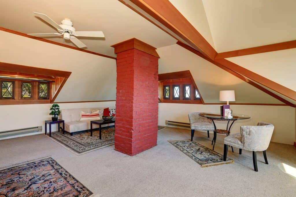 Large upstairs living room with cozy sitting area and a lot of carpet
