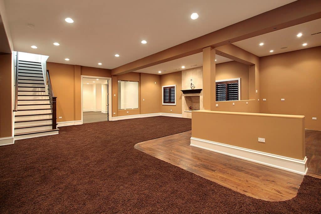 Empty lower level basement with carpeted floor