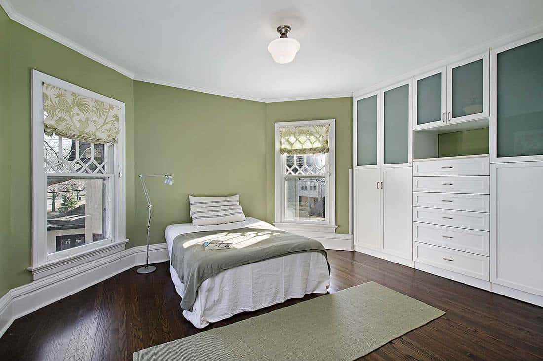 Master bedroom with green walls