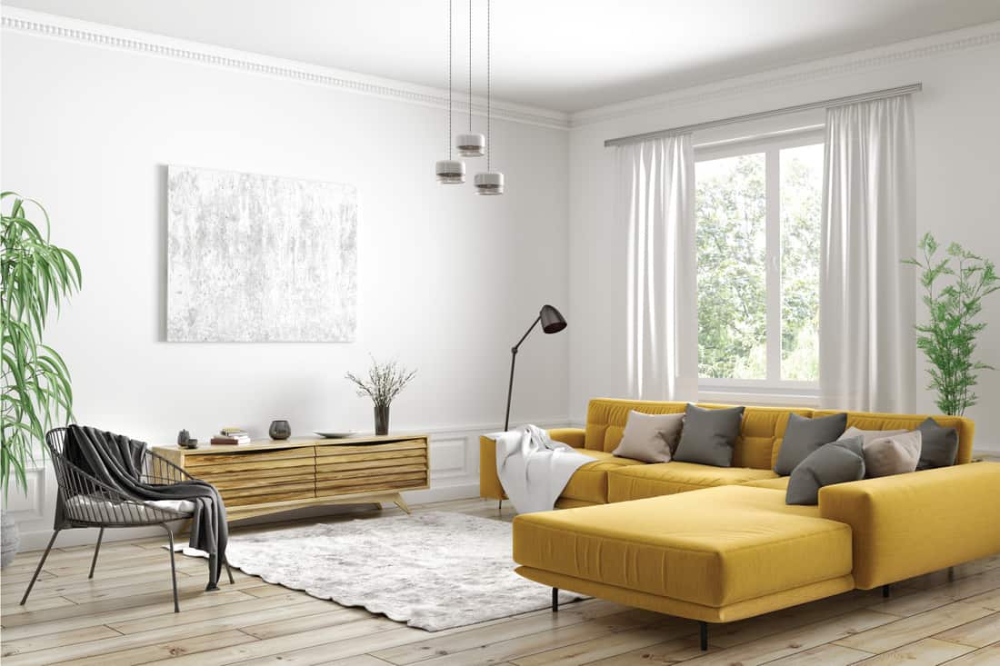 Design d'intérieur moderne d'appartement scandinave, salon avec canapé jaune, buffet et fauteuil noir