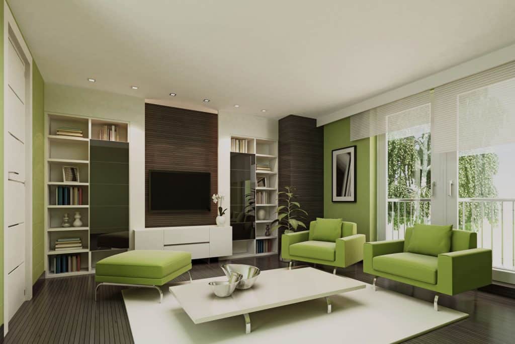 Modern interior of a nature color inspired living room with green sofas, white accent chairs, and huge window on the background