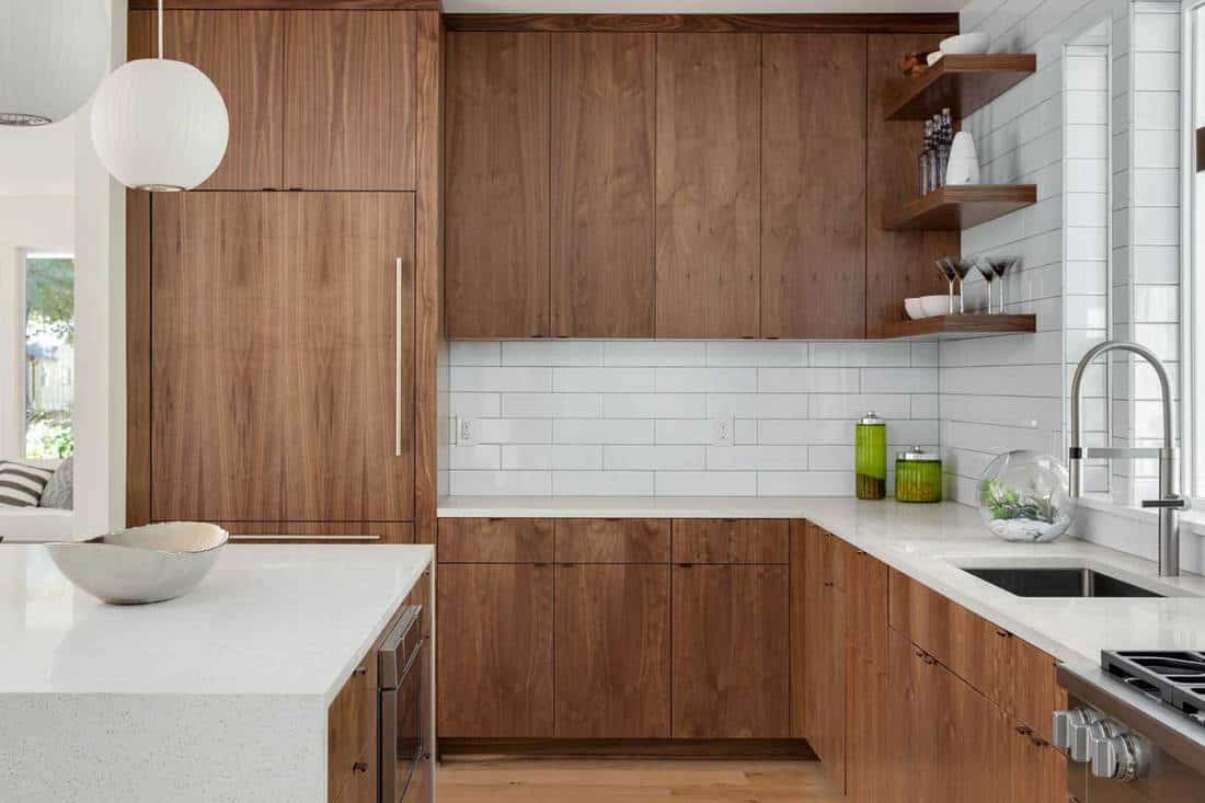 Modern kitchen with laminated wood cabinets, Can You Paint Laminate Furniture?