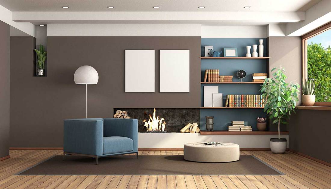 Modern living room with fireplace, brown wall and blue armchair