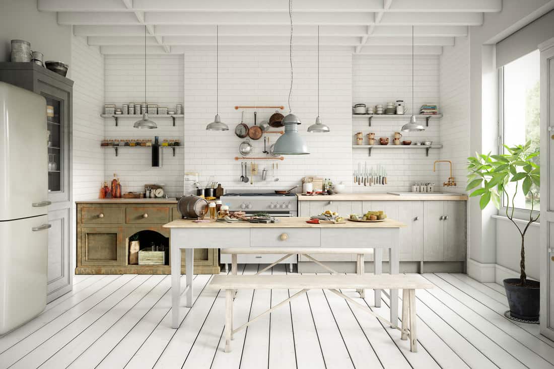 Intérieur de cuisine domestique de style scandinave avec une table à manger, un comptoir de cuisine et de nombreux accessoires