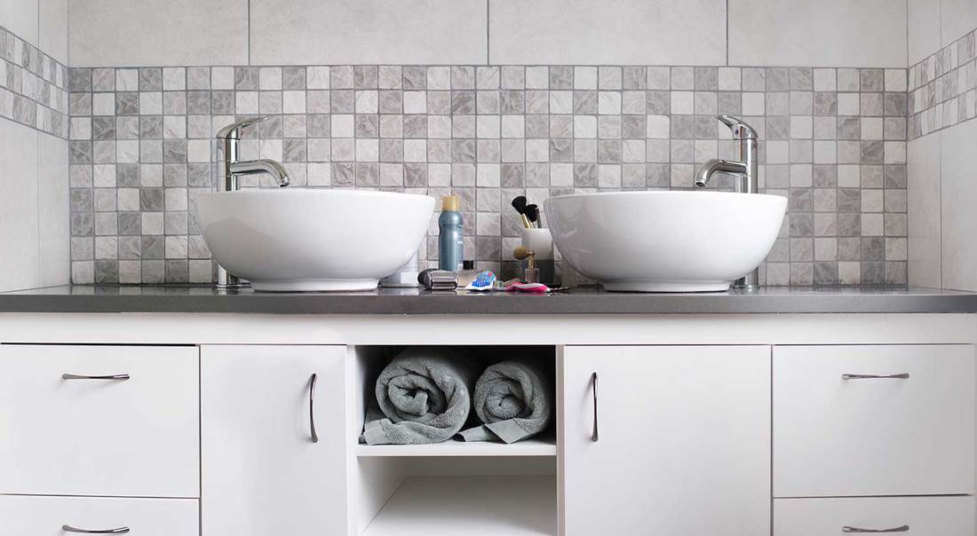 Shot of master bathroom sinks and vanity in luxury home