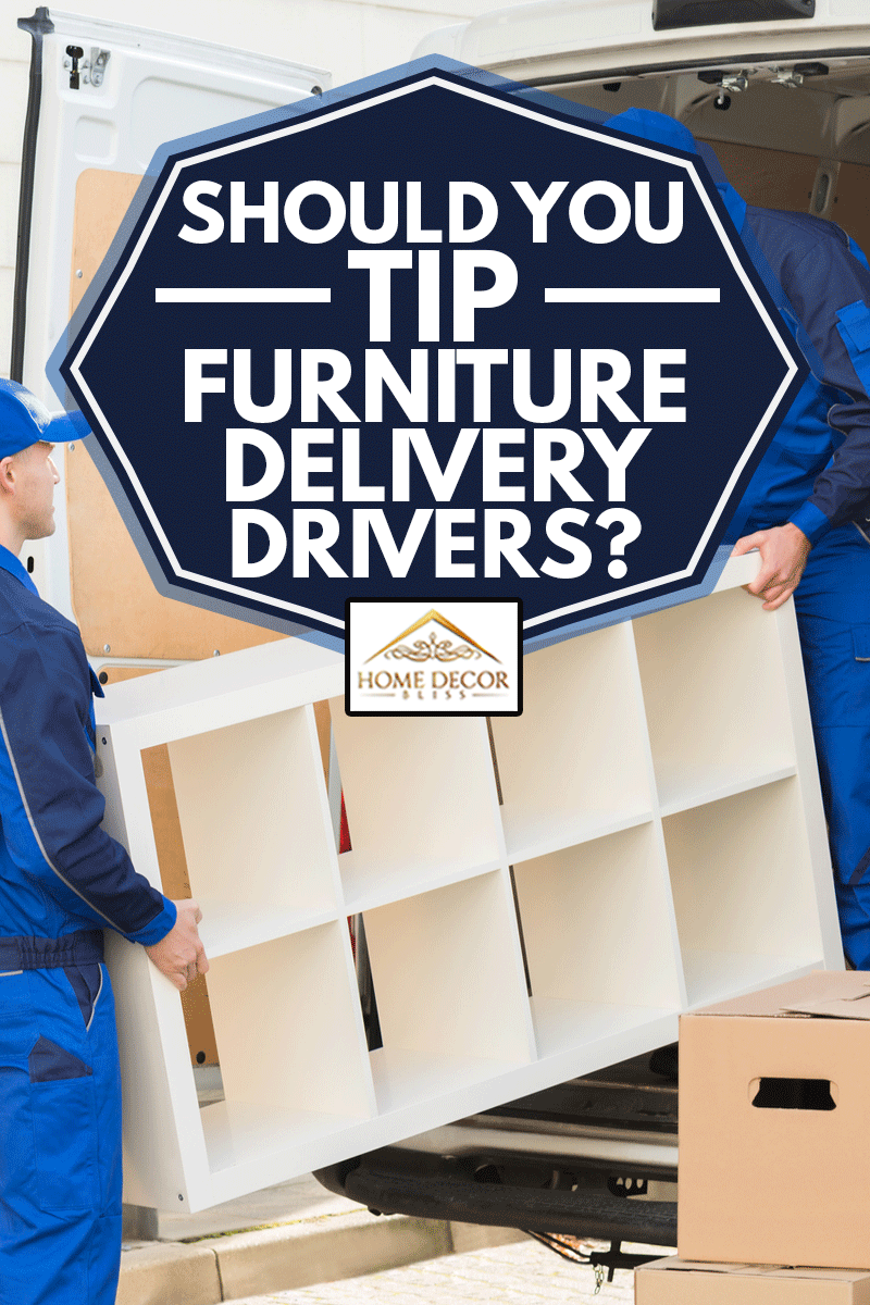 Young male movers unloading furniture and cardboard boxes from truck on street, Should You Tip Furniture Delivery Drivers?