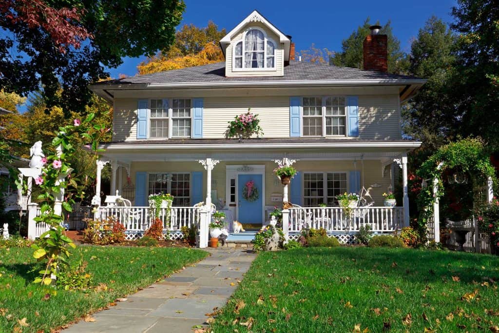 Tidy Prairie Style house with Victorian embellishments in the fall