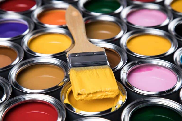 Tin cans with paint, brushes and bright palette of colors, How Long Does Paint Last If Opened?