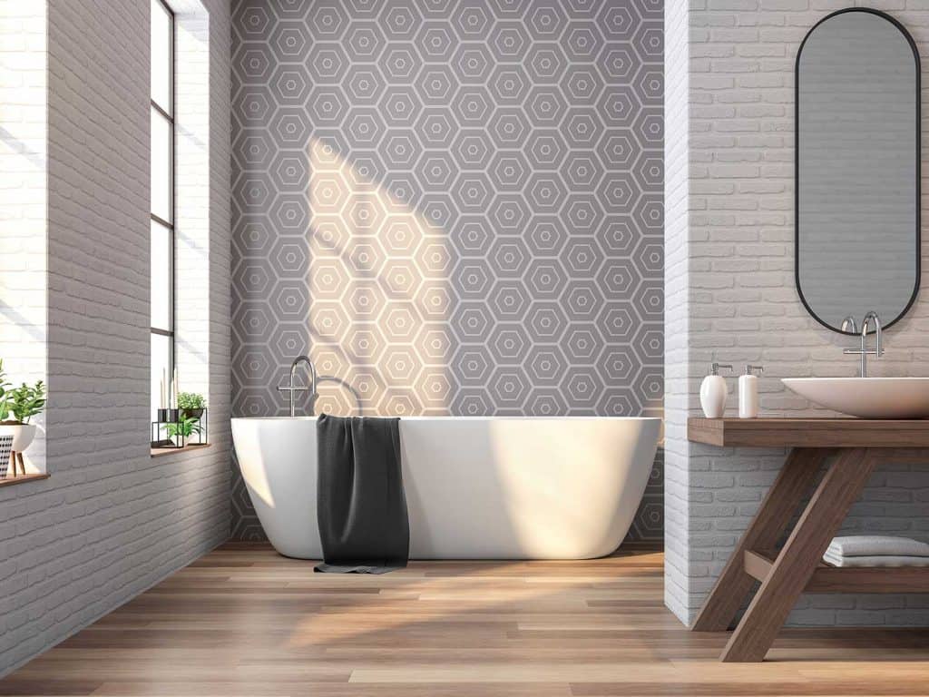 Salle de bain vintage avec mur en brique blanche et carrelage gris