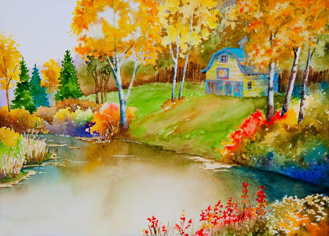 Watercolor painting showing beautiful river landscape with a house