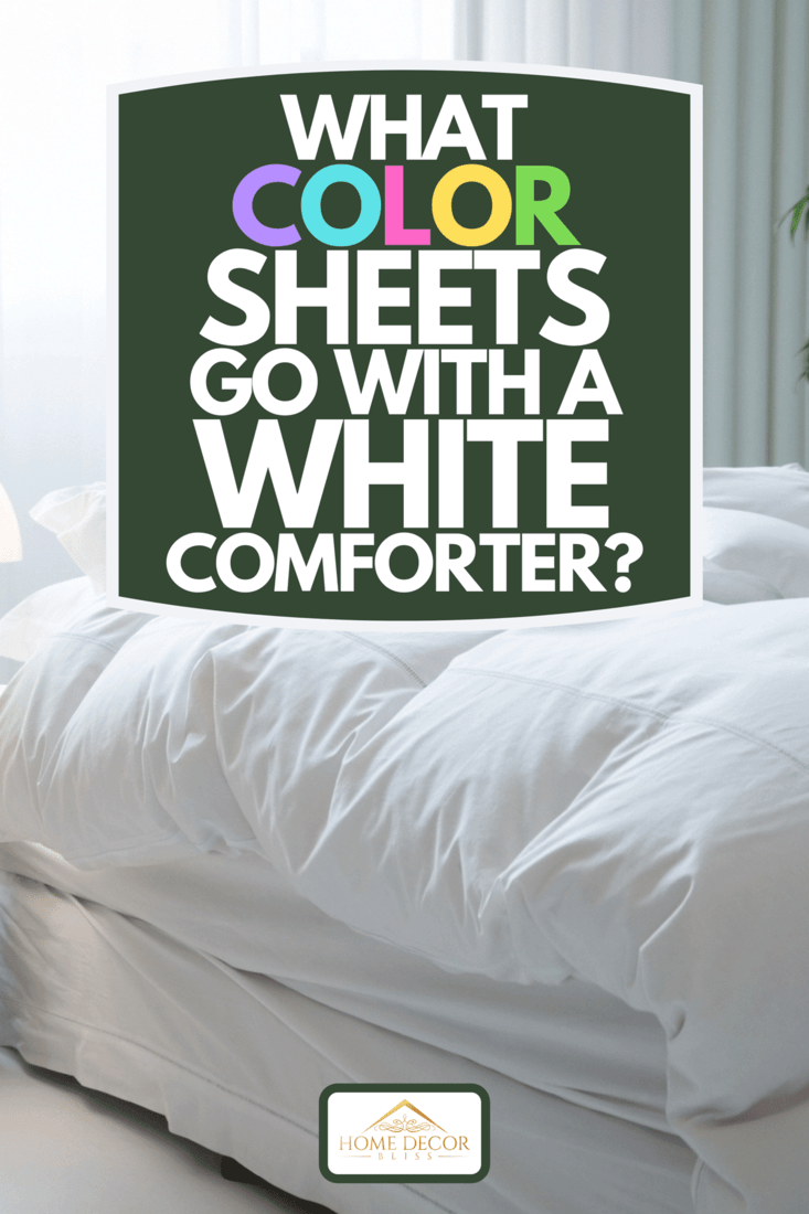 A bedroom with white comforter and bedside lamp, What Color Sheets Go With A White Comforter?