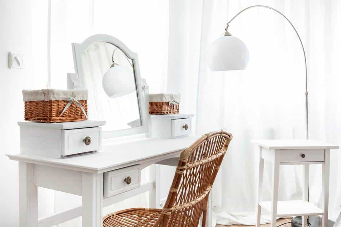 White dressing table with wicker elements, How To Get Makeup Off Dressing Table [5 Techniques]