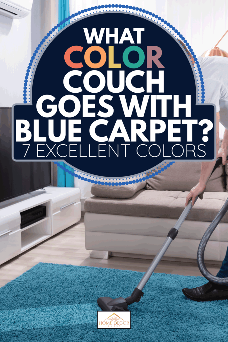 Young Man Cleaning Blue Carpet With Vacuum Cleaner At Home. What Color Couch Goes With Blue Carpet [7 Excellent Colors]