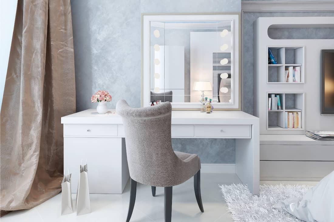 art deco style dressing table with light bulbs inset on the mirror, white furniture. Where To Place A Dressing Table In The Bedroom [5 Great Ideas]