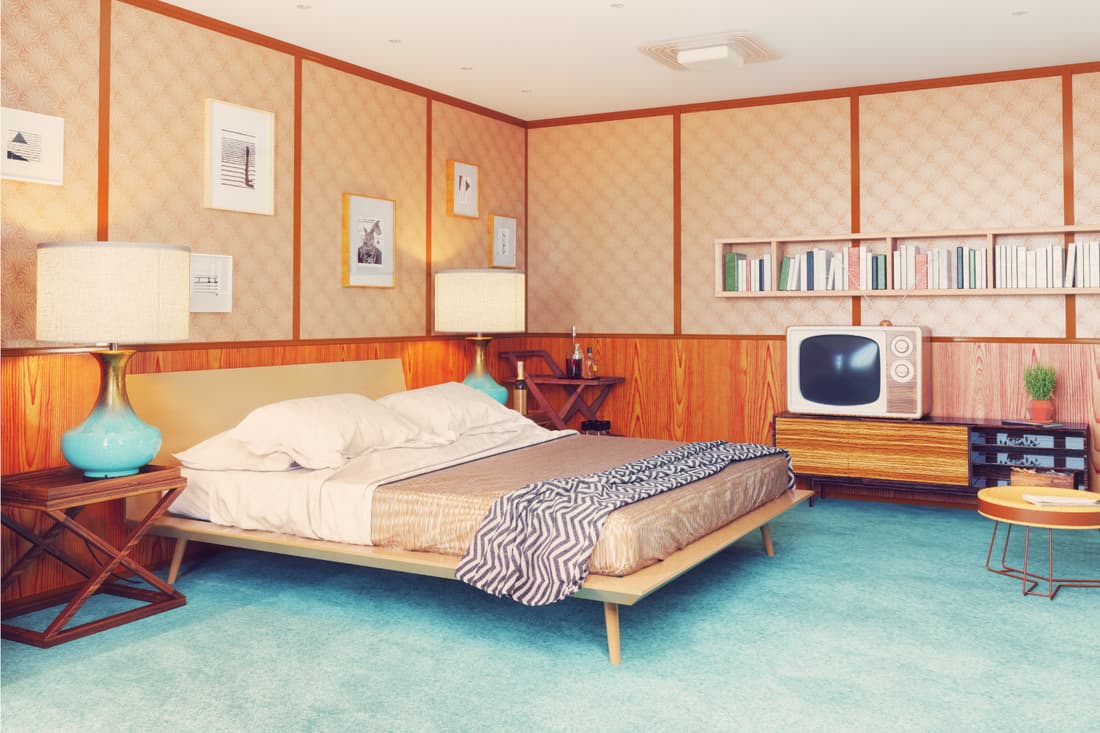 beautiful vintage bedroom interior. wooden walls. faux television, turquoise accents, and tons of tan. retro glory
