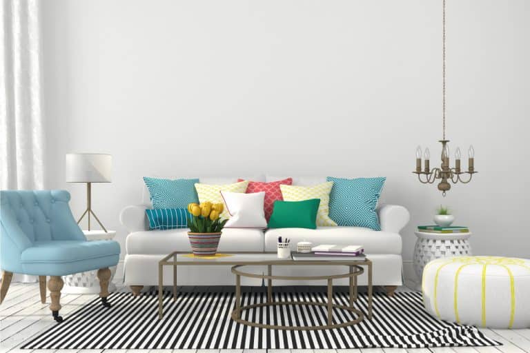 living room with colorful pillows and mismatched couches. 11 Living Rooms With Mismatched Couches