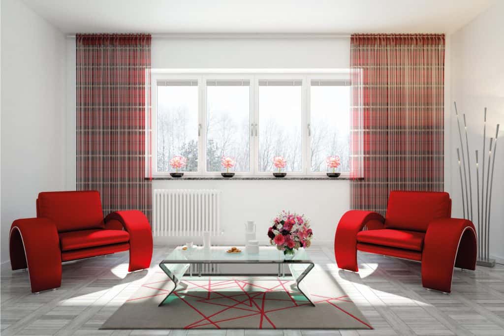 Modern and cozy living room with bold plaid curtains