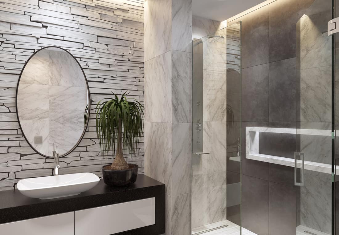 natural stacked white matte stone wall and large marble matte tiles