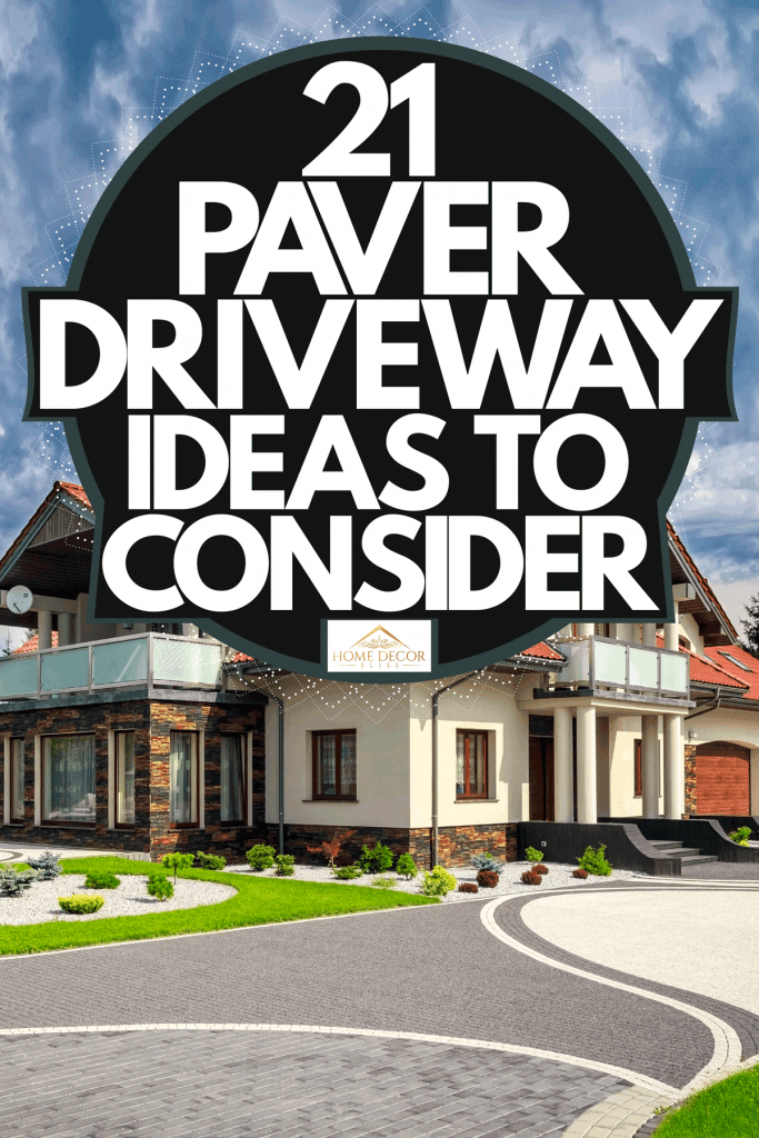 A luxurious huge mansion with red asphalt roofing, gorgeous lawn with small plants, and a patterned driveway, 21 Paver Driveway Ideas To Consider