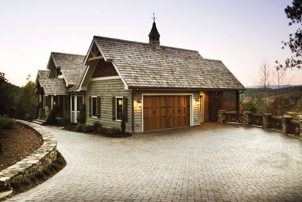 A luxurious country rest house with a paver driveway