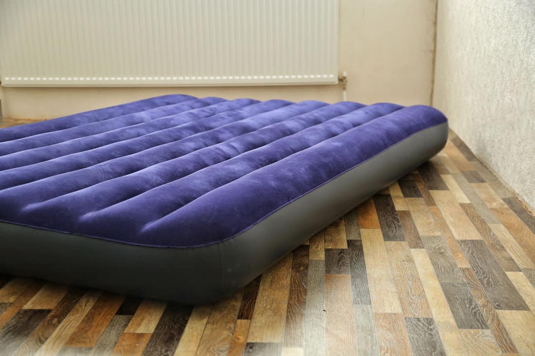 Air mattress left in the living rorom flooring