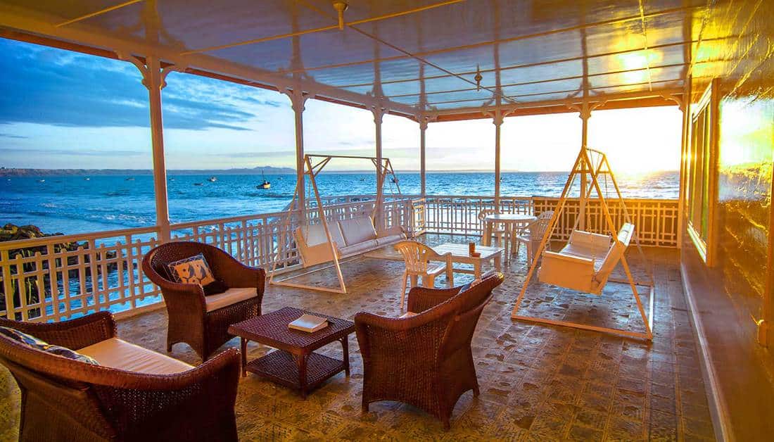 Beach house terrace lounge at sunset