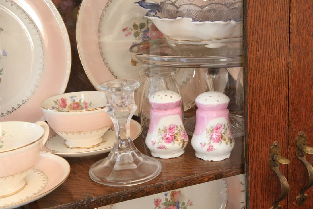 Beautiful antique china and glassware in an old oak cabinet