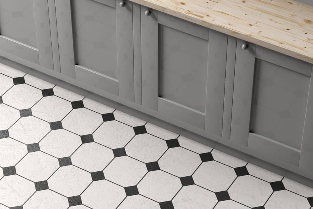 Black and white tiles inside a modern kitchen