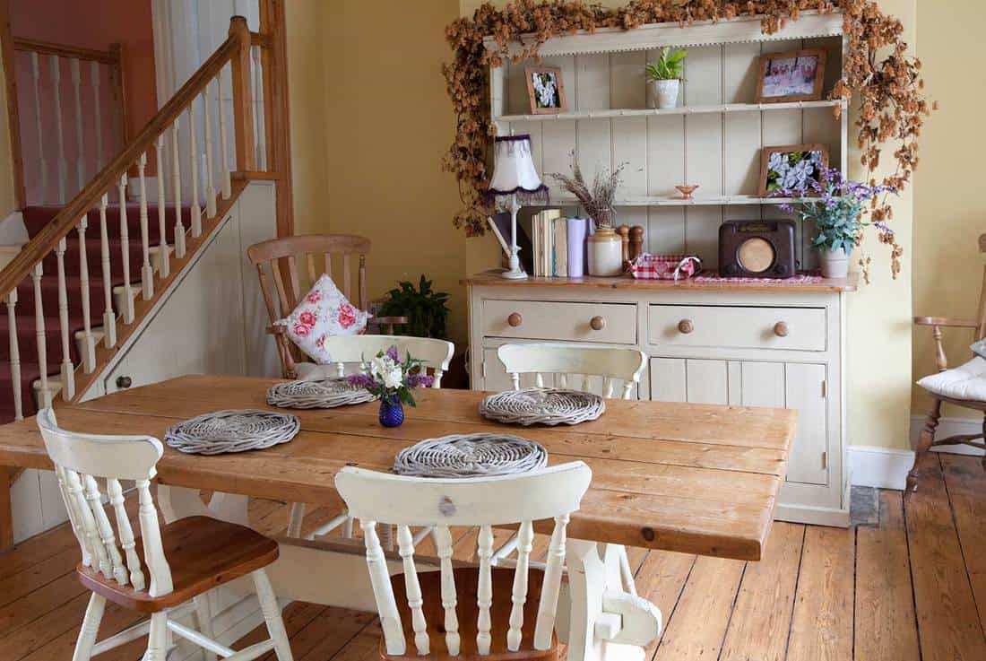 Classic homely kitchen breakfast room with wooden floor and furniture