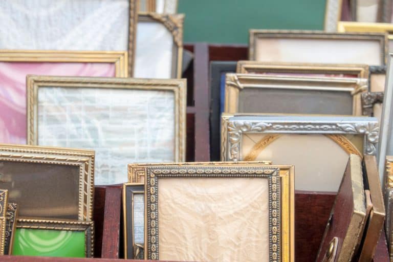 Collection of small old picture frames at the flea market, How Much Do Picture Frames Cost?