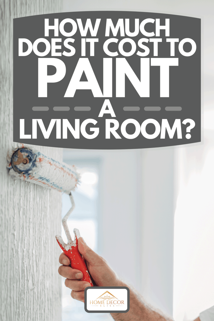 A painter at work with a paint roller painting living room wall, How Much Does It Cost To Paint A Living Room?